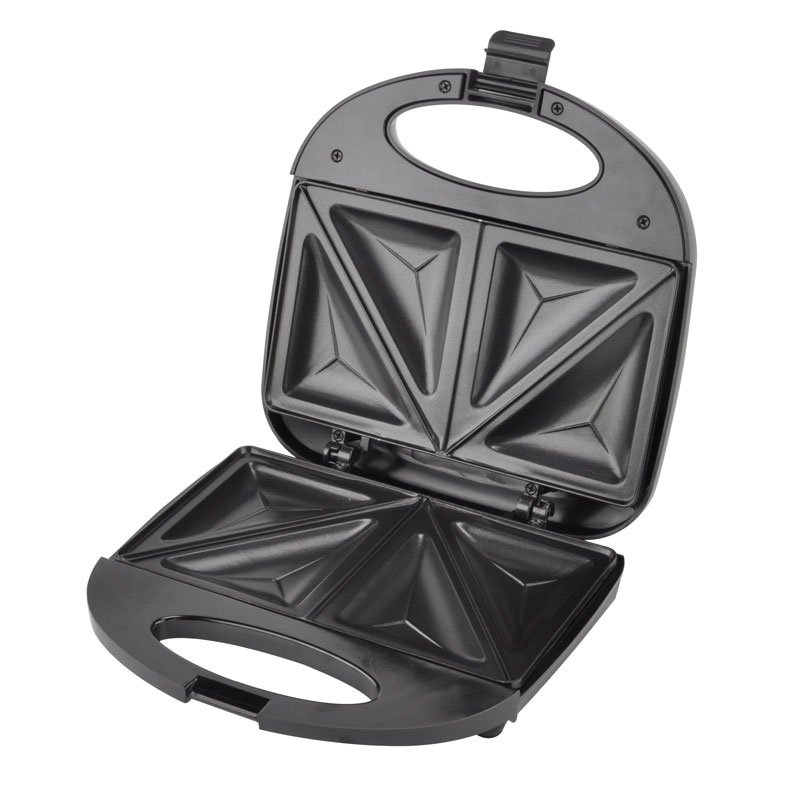 Vilket material är bakplåten på en smörgåsmaskin gjord av?