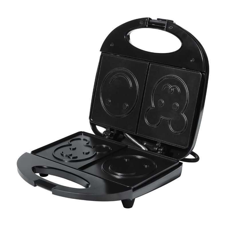 Funktioner hos smörgåsmaskinen för leende tallrik